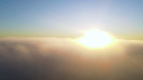 hazy sunrise sun rays time lapse in foggy clouds