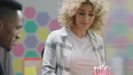 young-business-people-celebrating-birthday-party-happy-african-american-woman-blowing-candles-enjoying-surprise-colleagues-cheering-together-in-multi-ethnic-office-celebration