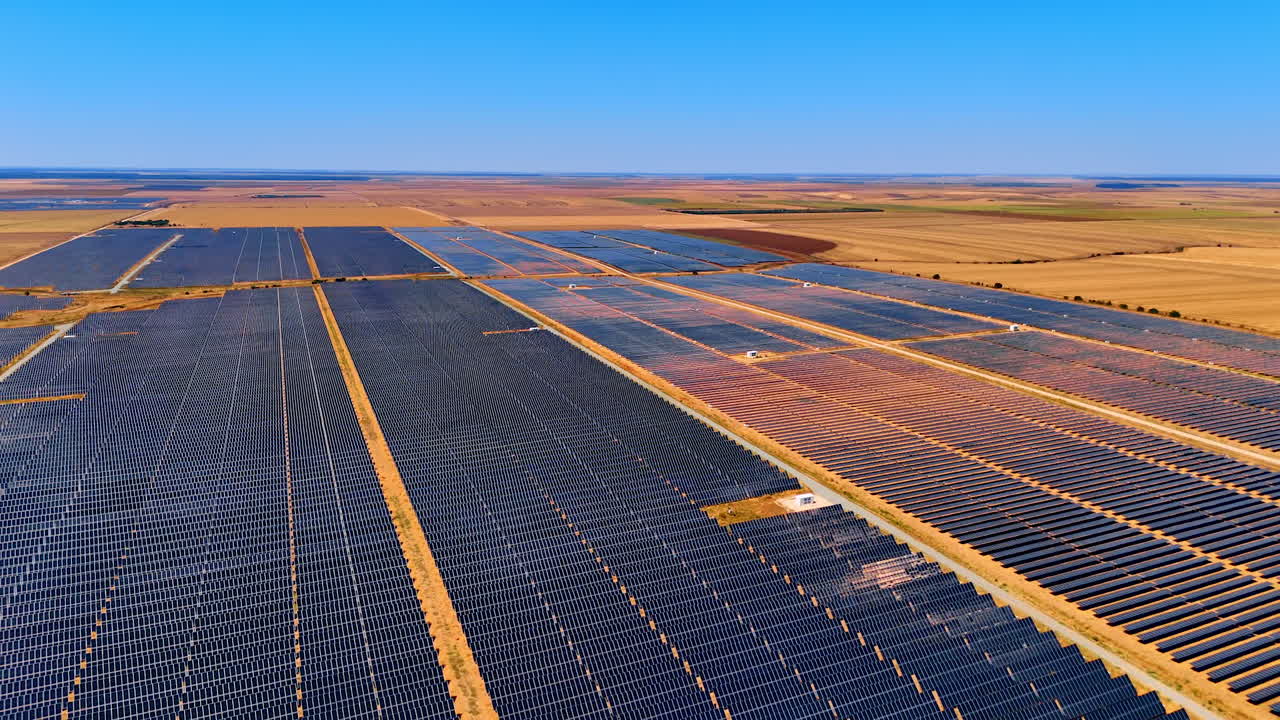 Enormous site covered with modern solar panels. Renewable energy concept. Aerial view