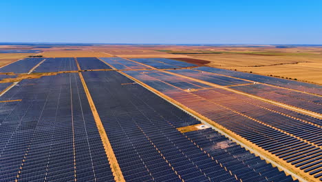 Enormous site covered with modern solar panels. Renewable energy concept. Aerial view