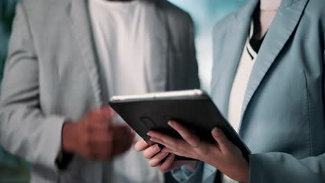 business people looking at tablet