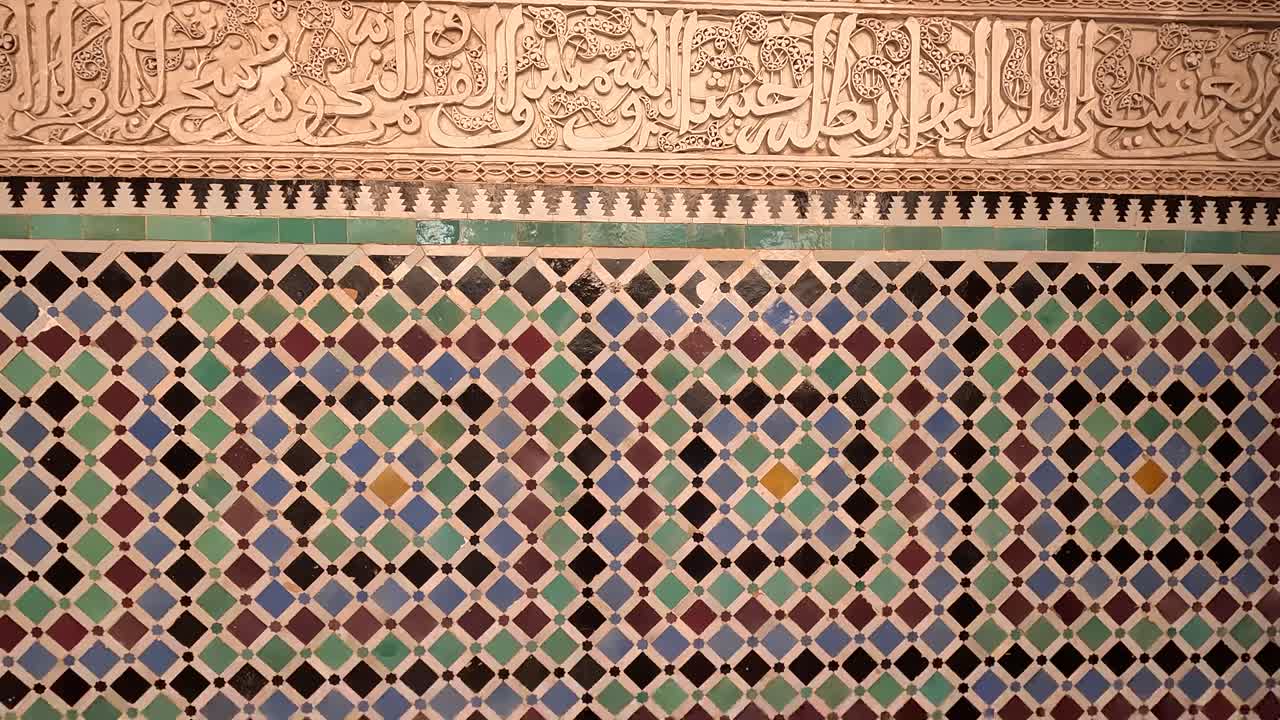 A Beautifully Crafted Mosaic Adorns the Wall in Morocco - Pan Up Shot