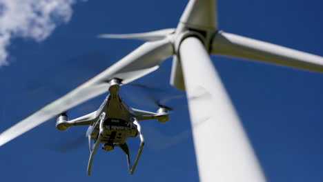 drone flying near a wind turbine