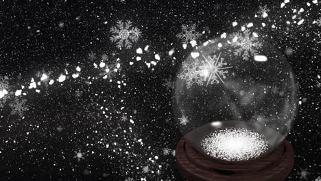 animation of snow and first star falling over snow globe on black background