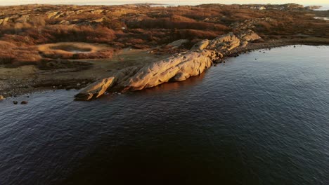 drone footage of seacoast in southern norway at golden hour