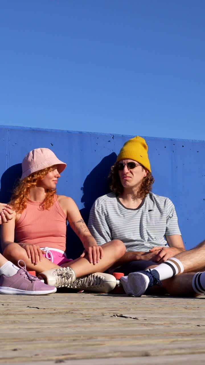 Friends hanging out with skateboards