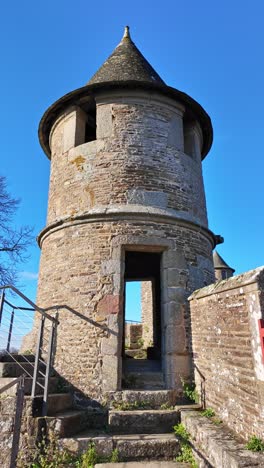 vertical walking movement towards the rounded tower of fougeres castle, fougères, france.