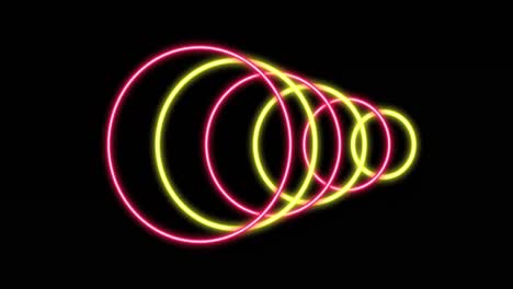 animación de círculos rosados y amarillos brillantes sobre un fondo negro