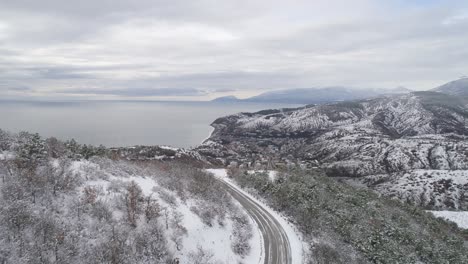 snowy coastal mountain view