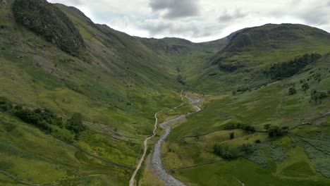 Drone-Aerial-footage-of-Seathwaite-a-small-hamlet-in-Borrowdale-valley-in-the-Lake-District-of-Cumbria