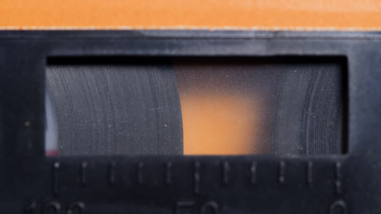 Close-up of an old audio cassette tape