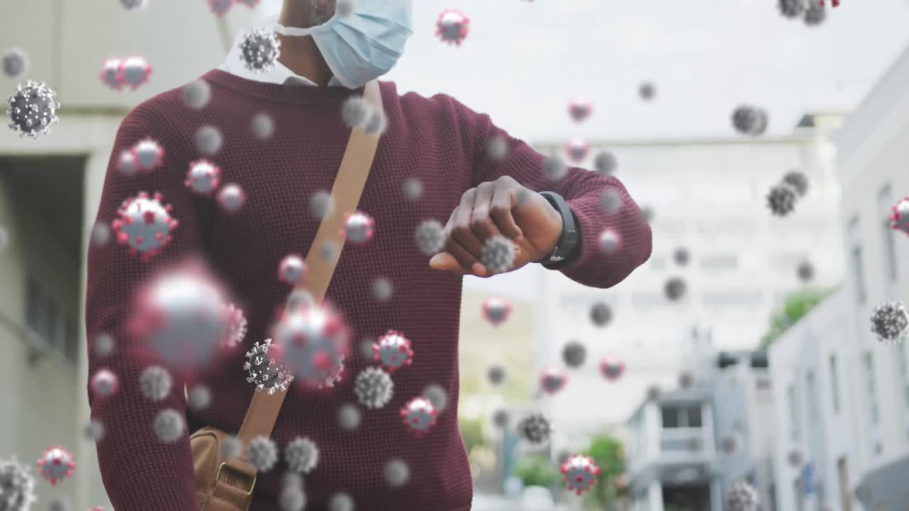 코로나19 세포가 아프리카계 미국인을 상대로 떠다니고 있습니다. 얼굴 마스크를 쓰고 있는 노인입니다.