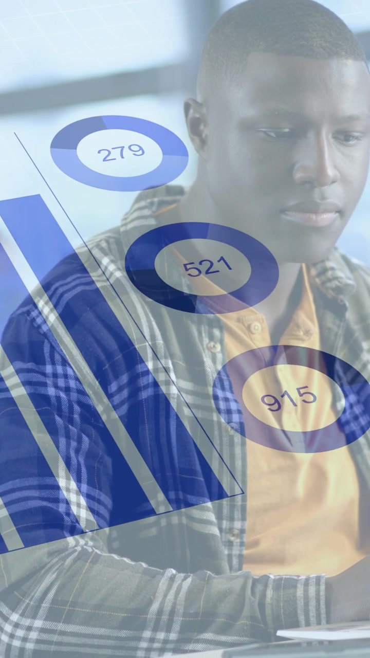 Vertical video: Man at desk typing on laptop, starting bar chart moving across frame for business