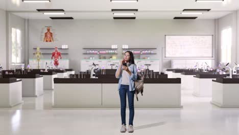 un adolescente usando un teléfono inteligente en un aula de ciencias