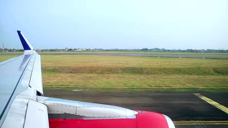 commercial airplane heading to runway for takeoff