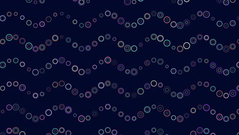 patrón de anillos abstractos de arco iris de neón en ondas sobre degradado negro