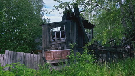 burnt wooden house in a forest