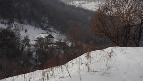 cabin in the snowy woods, kazakhstan