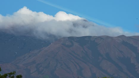 close shot of smoking mt. etna, volcano in sicily, italy