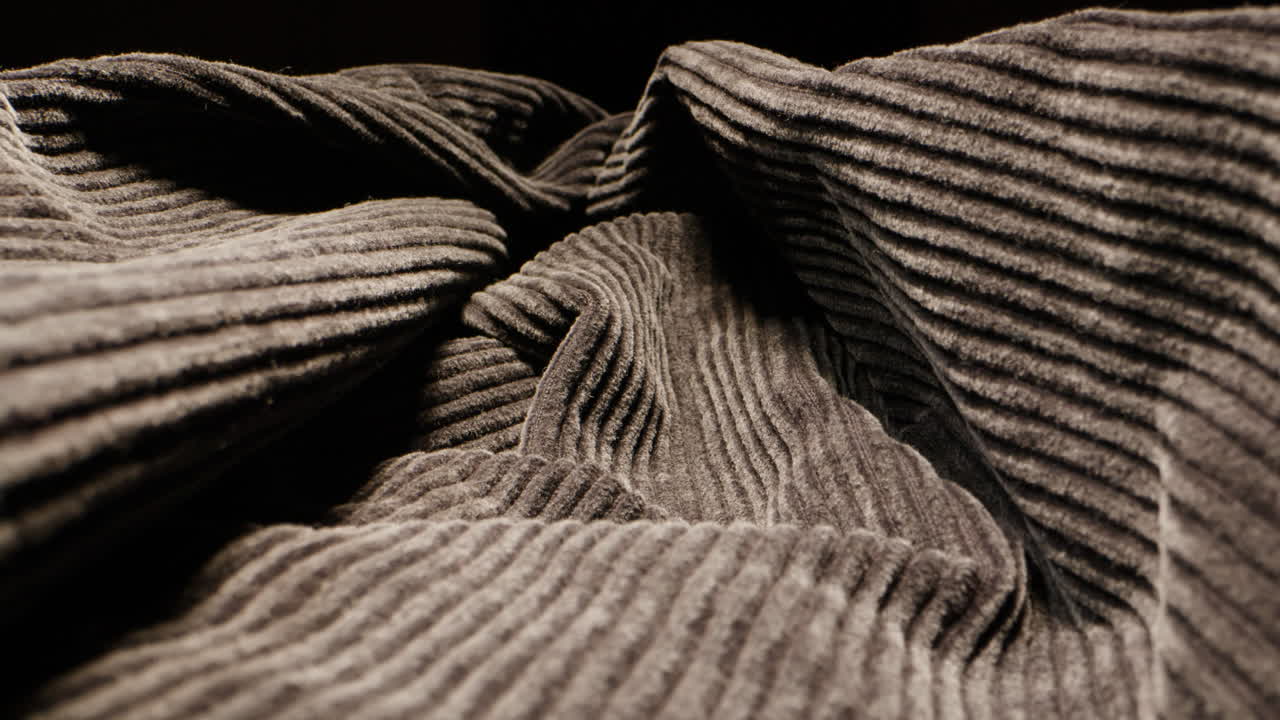 Velvet textile cloth texture close-up macro. Jacket with zipper. Fashion fabric multicolor. Sheep wool for clothes