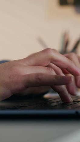 woman typing on laptop