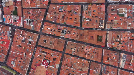 tile roof of madrid spain city center streets aerial top shot abstract