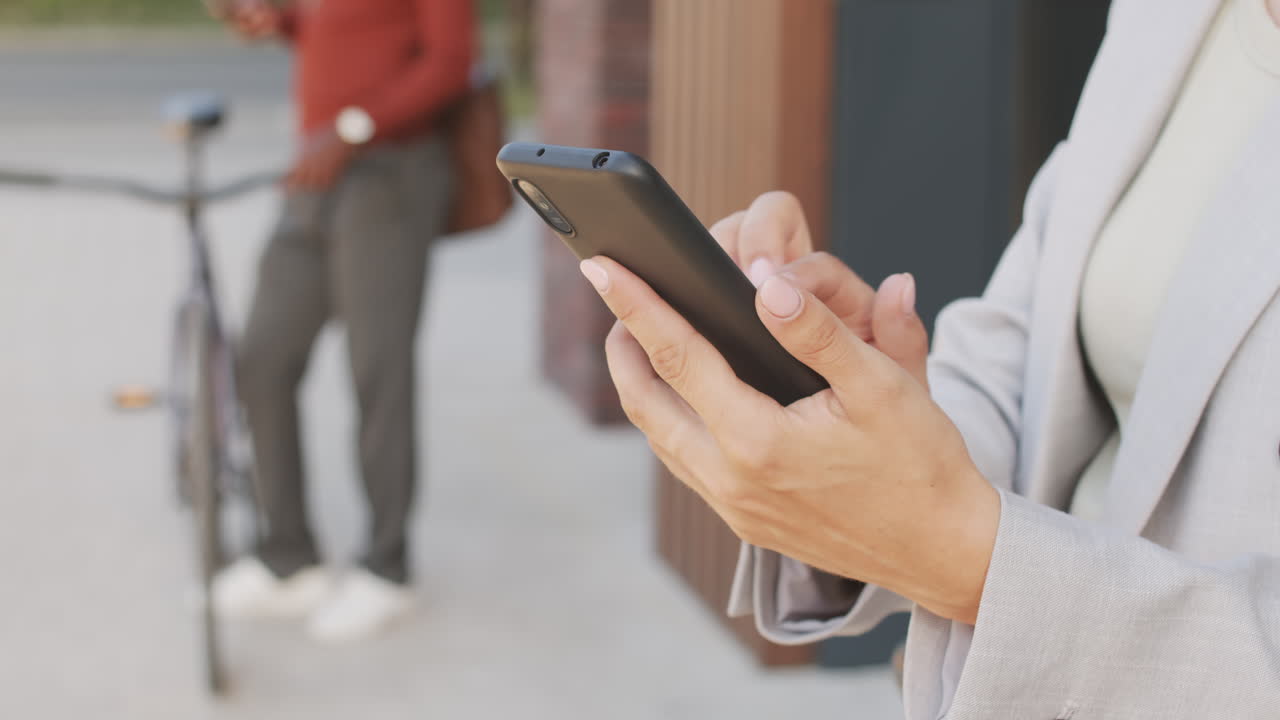 Woman Texting Message on Smartphone
