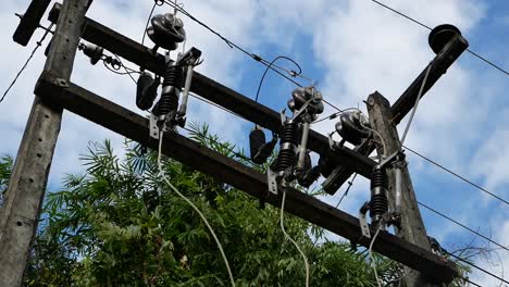 Electricity-Tower-in-Rural-Village,-Thailand