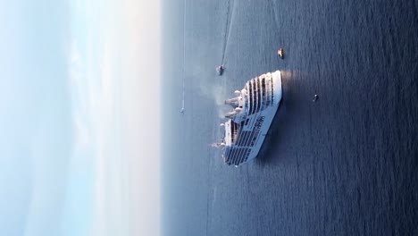 Vertical-Shot-Cruise-Ship-And-Sailboats-Near-Dubrovnik-In-Croatia