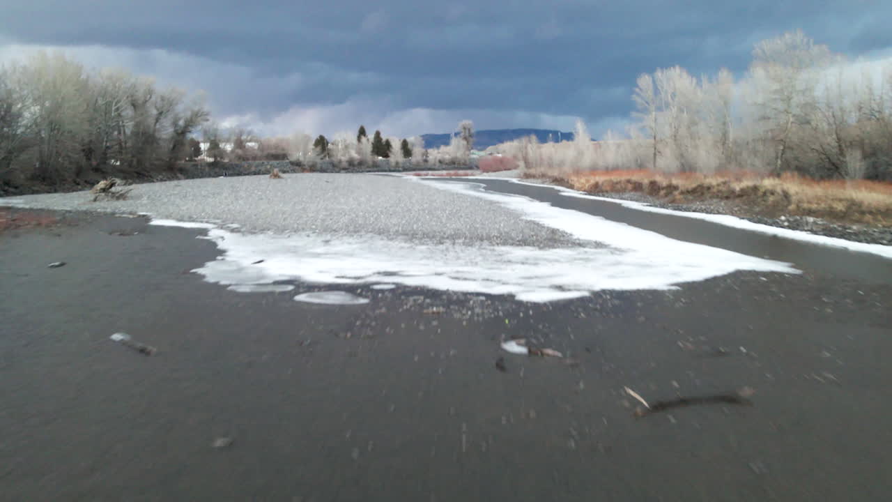 Dead frozen yellowstone river Montana high plains aerial