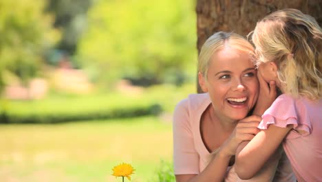 Young-woman-having-fun-with-her-daughter