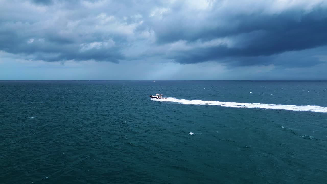 A boat running from a storm in South Florida.