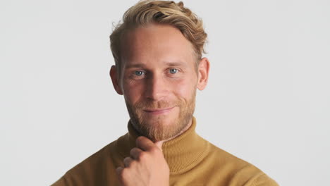 attractive male model posing in studio