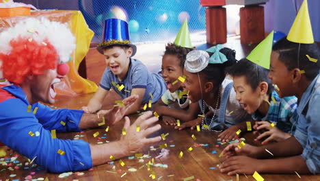 children wearing party hats celebrating with confetti animation over colorful background