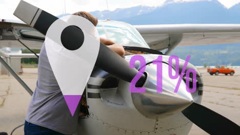 animation of locator icon and rising percentage over caucasian male pilot working on plane engine