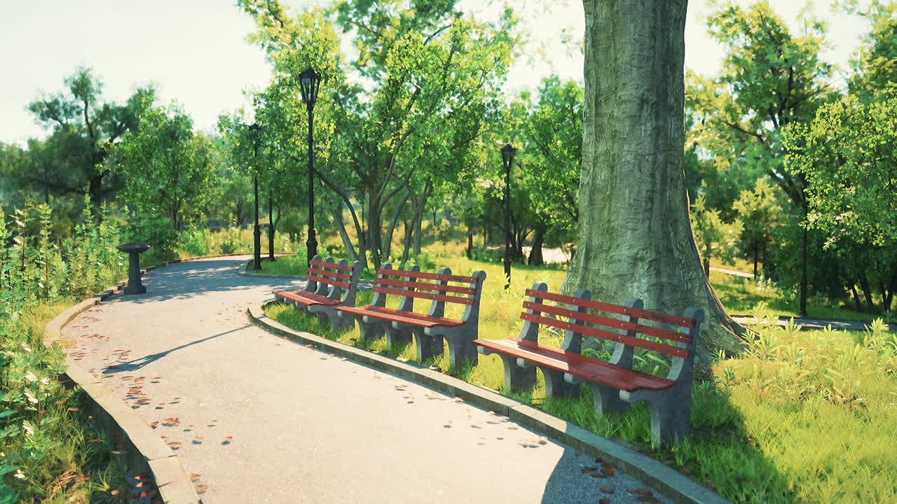A serene park pathway with red benches surrounded by lush greenery