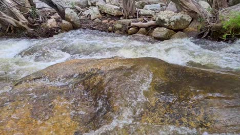 flowing water cascading over rocks at emerald creek falls