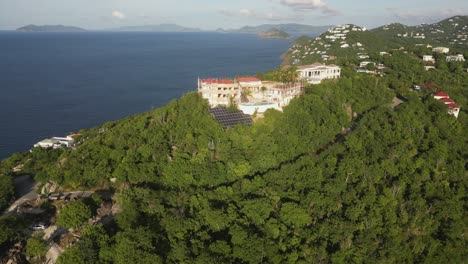 aerial retreats from mansion under construction on st thomas hill top