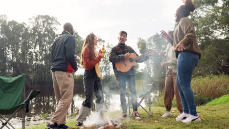 Friends,-bonfire-and-guitar-with-singing