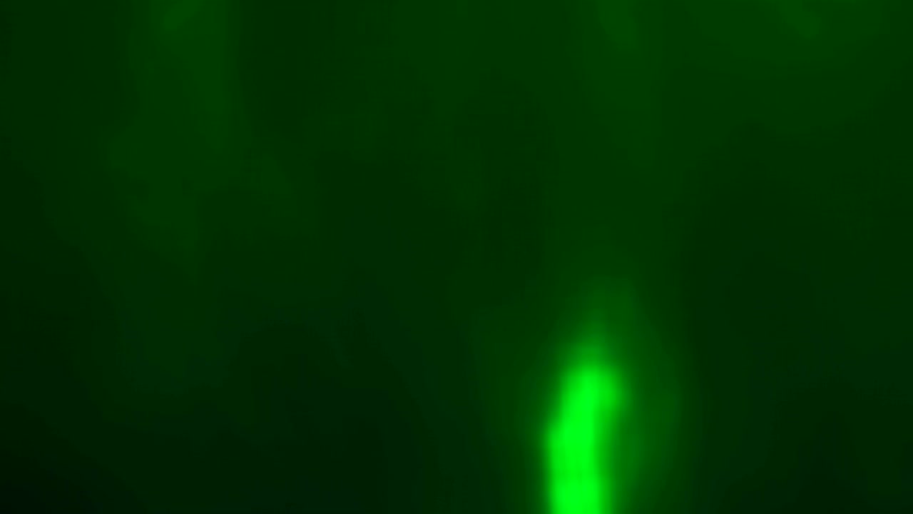 fondo abstracto con manchas de luz multicolores en movimiento.