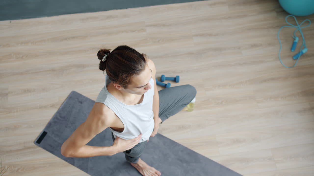 Man Performing Yoga Poses