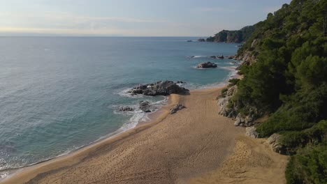 mediterranean beach paradisiaca turquoise blue waters no people aerial view drone spain catalunya costa brava blanes lloret de mar mallorca balearic islands