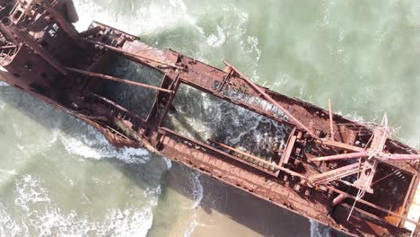 Shipwreck-Dimitrios-at-Valtaki-Beach,-Peloponnese,-Greece---Overhead-Ascending-Aerial