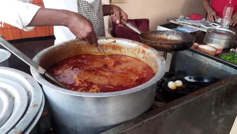 Mutton-OR-Gosht-Masala-OR-Indian-gosht-manda-with-some-seasoning-served-with-Naan-or-Roti---Gosht-Manda