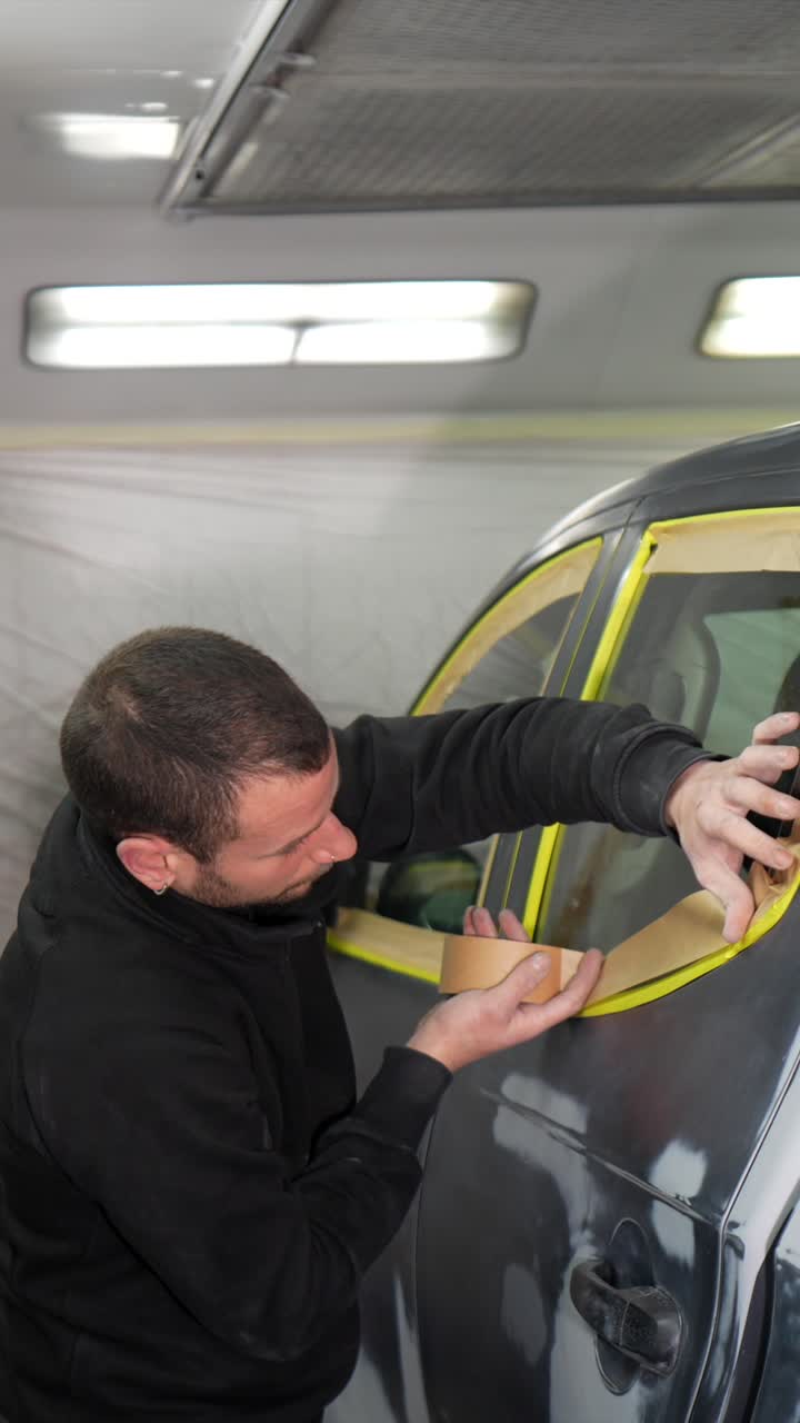 Man Masking Car Window with Tape in Auto Body Shop | Premium Stock ...