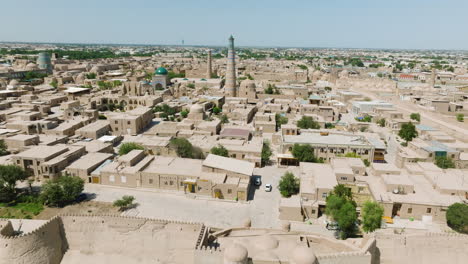 Flying-Over-Historical-Heritage-Site-Of-The-Old-Town-Of-Khiva-In-Xorazm-Region,-Uzbekistan