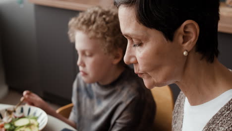Mother and Child Eating a Healthy Salad Together