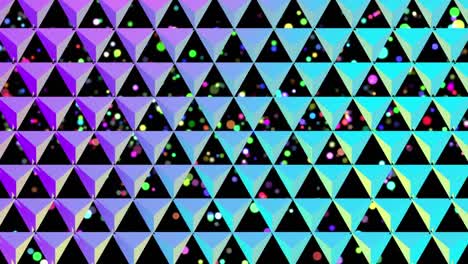 Rising-coloured-circles-behind-a-grid-of-colourful-reflective-triangles-on-black