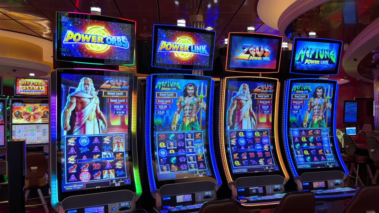 Casino digital slot machines with Greek gods and flashing lights, jackpot
