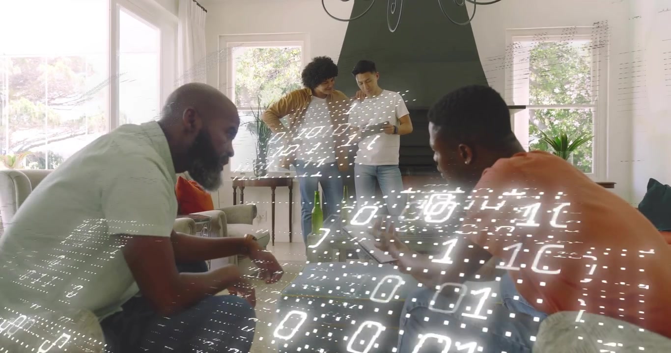 tech team around tablet initiating hologram as others tapping code and raising device cheering win
